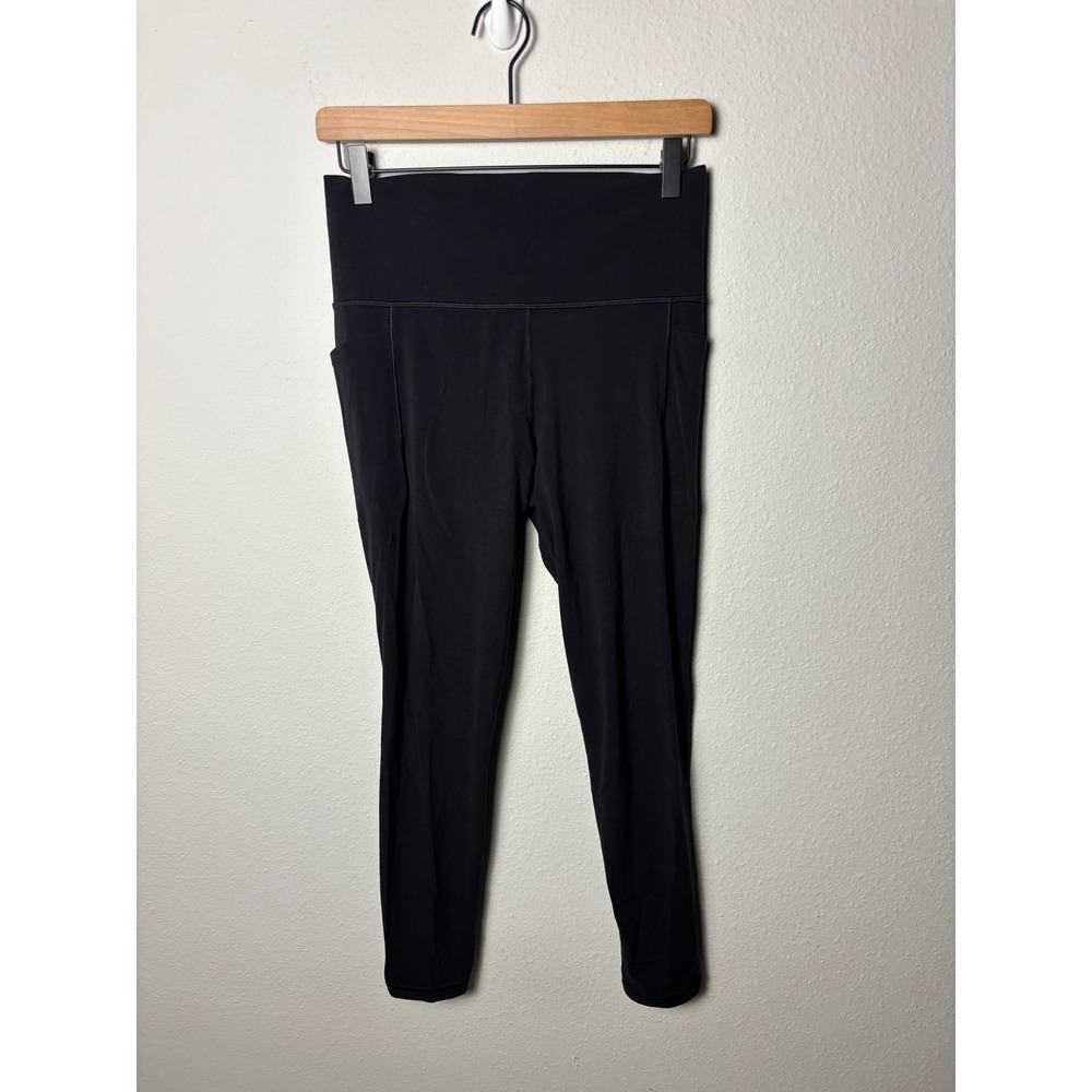 Athleta Salutation Stash Tight Black High Rise Leggings Pockets Medium 26 Inseam